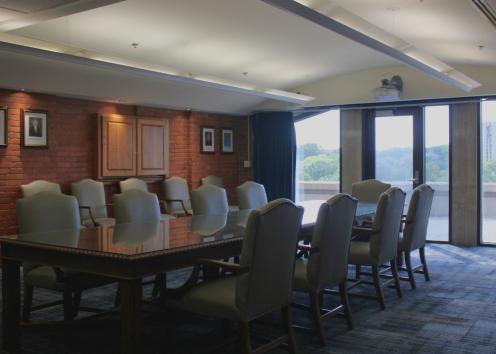Governors Room with fixed long table and seating for 14