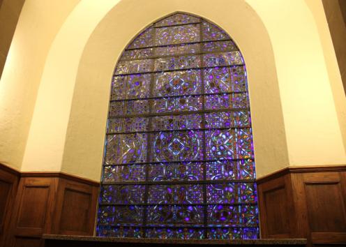 Inside South Side stain glass arched window